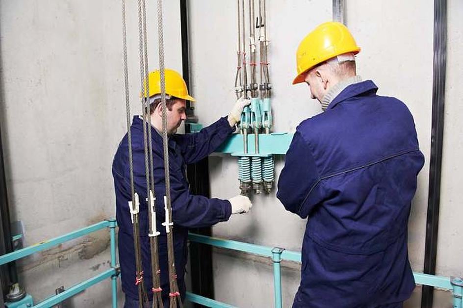 Felevator engineers during installation
